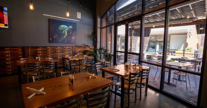 Interior, tables and chairs, picture on the wall