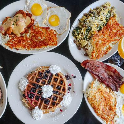 Plated breakfast dishes, top view.