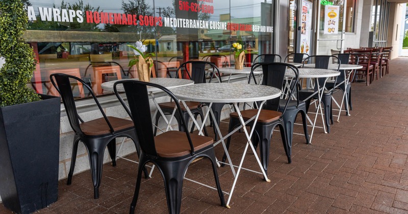 Exterior, seating area with tables and chairs