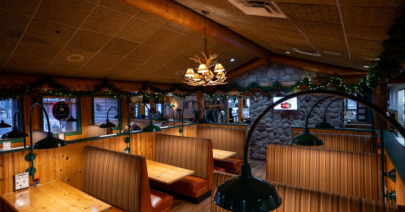 Cozy and intimate interior seating area with upholstered booths