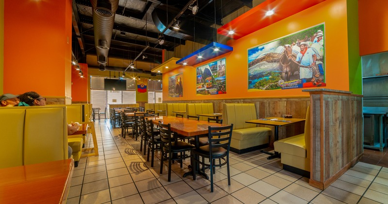 Interior, dining area with tables, chairs and dining booths
