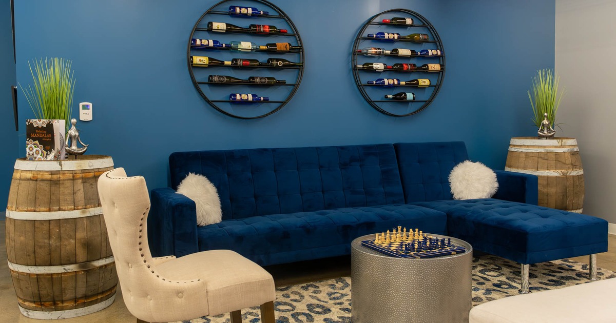 Interior, cozy room with couch and chess table