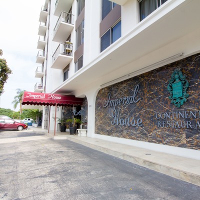 Exterior, view of the front entrance and parking lot.