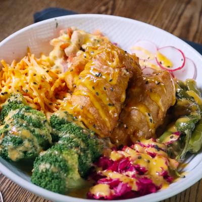 Mixed meal served in a bowl.