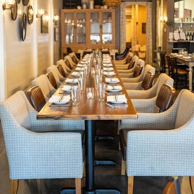 Long dining table, fully set.