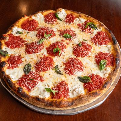 The old world margarita style pizza, served.