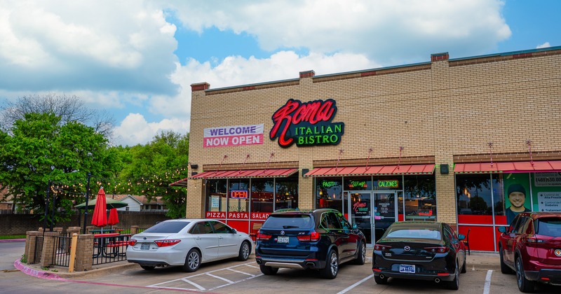 Restaurant parking lot with parked cars