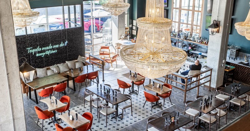 Interior, isometric view of the restaurant, seating area, large crystal chandeliers