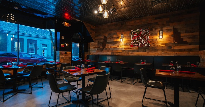 Interior, dining area, concrete floor, restaurant entrance, shop window, wooden details