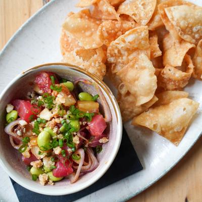 Edamame, wonton chips, shallots, Macadamia nut, pineapple, scallion