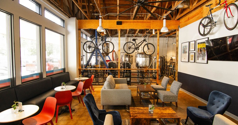 Interior, seating area with bicycles hanging as a decoration