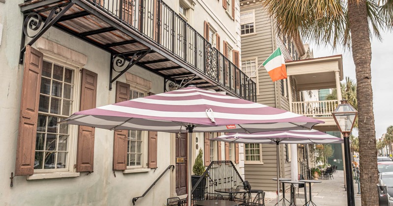 Exterior, tables with parasols and chairs