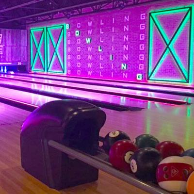 Bowling balls on the rack.