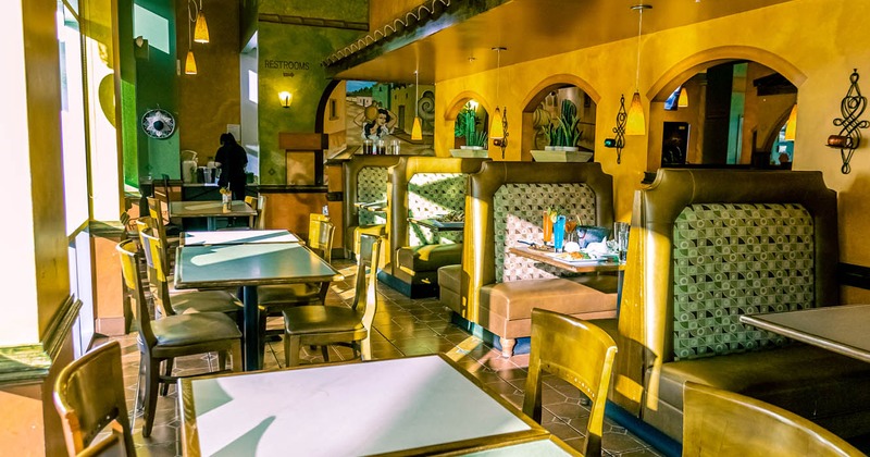 Interior, lined up dining tables and booths