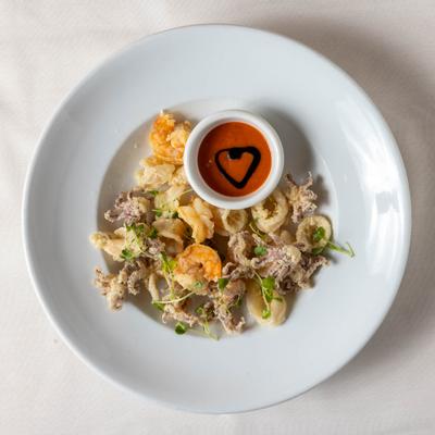 Lightly fried calamari and shrimp, served with a sweet and spicy aioli.