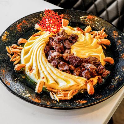 Fatteh with beef tenderloin.