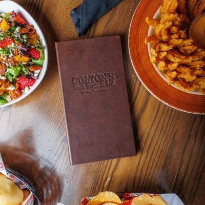 Table menu and various foods.