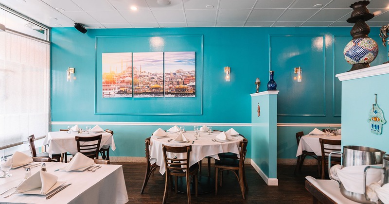Interior space, dining area with set tables ready for guests