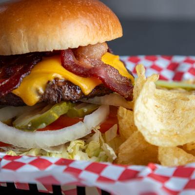 Bunker burger served with potato chips.