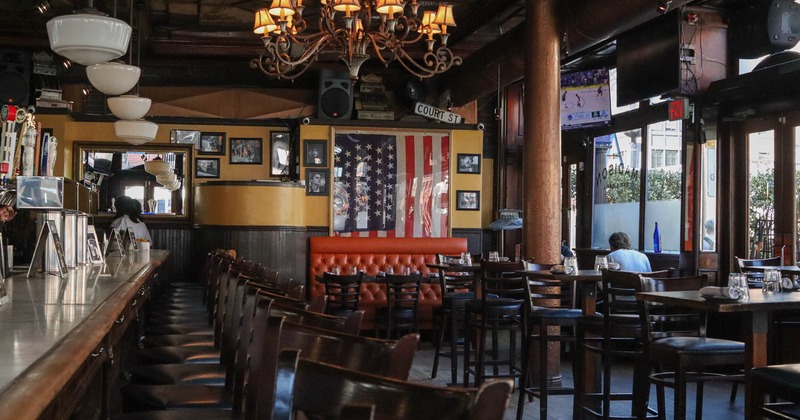Bar and dining area, wooden tables and chairs