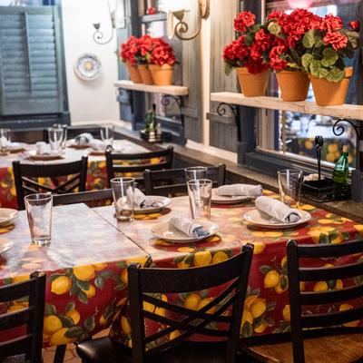 Tables and chairs, flowers.