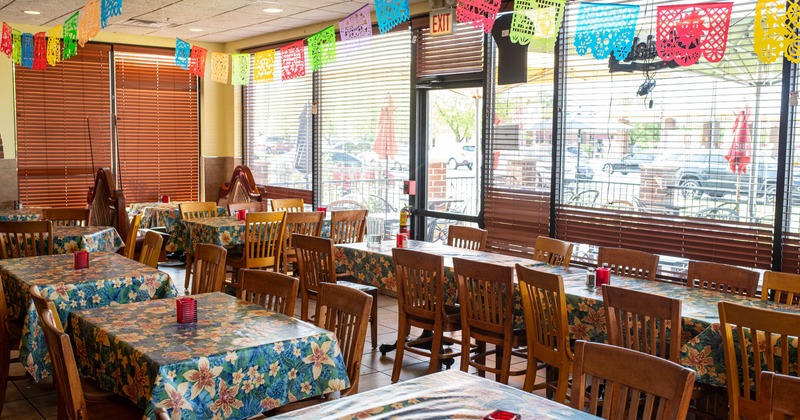 Interior, dining area, restaurant entrance, tables with chairs, shop windows with blinds