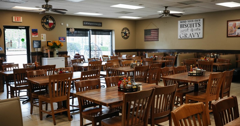 View of a dining area, tables ready for guests