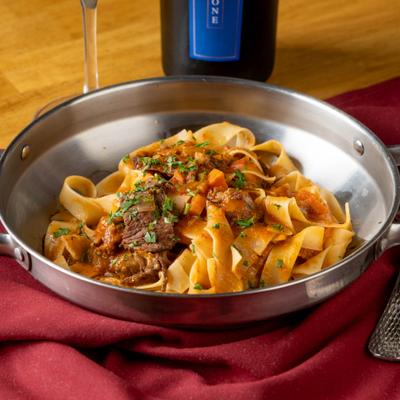 Pappardelle pasta with slow-cooked braised short ribs.