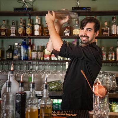 Bartender mixing the cocktail