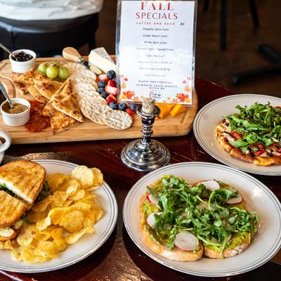 Assorted food plates displayed on a table inside.