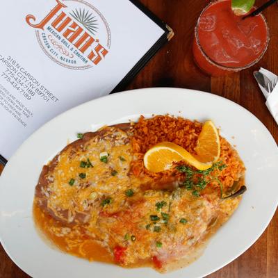 Roasted poblano chile filled with jack cheese and deep fried, topped with ranchera sauce and cheese.