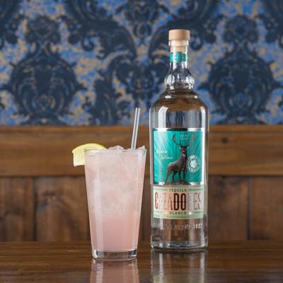 Prickly Pear cocktail and a bottle of white tequila