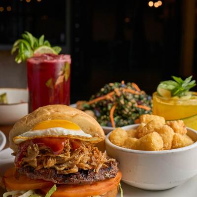 A fully served table with food and drink.