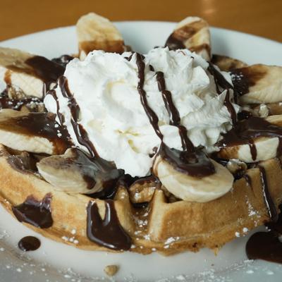 The Nutty Waffle with nutella, walnuts, bananas, and whipped cream.