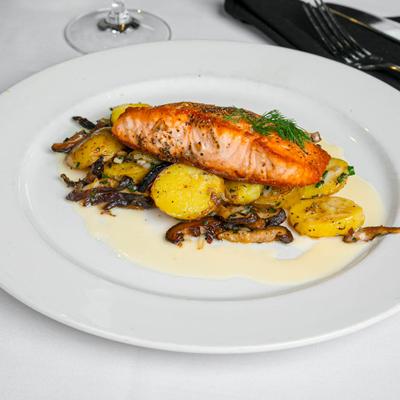 Scottish King Salmon with leek, potato, and oyster mushrooms.