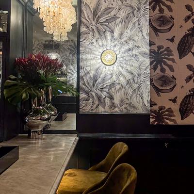 Photo of the front of the bar lighted, with no customers..