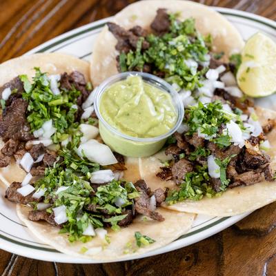 Steak tacos, angled view.