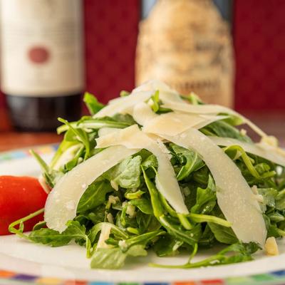 Arugula salad with parmesan shavings.