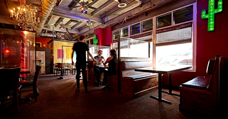 Guests sitting at dining booth