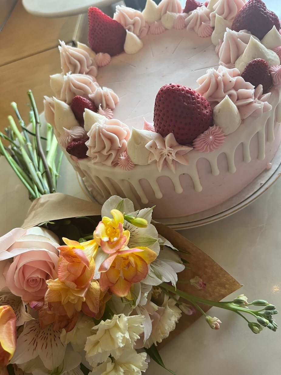 Give you something with strawberry, you say?  No problem!  Strawberry cake filled with house-made strawberry jam and covered in a strawberry buttercream.