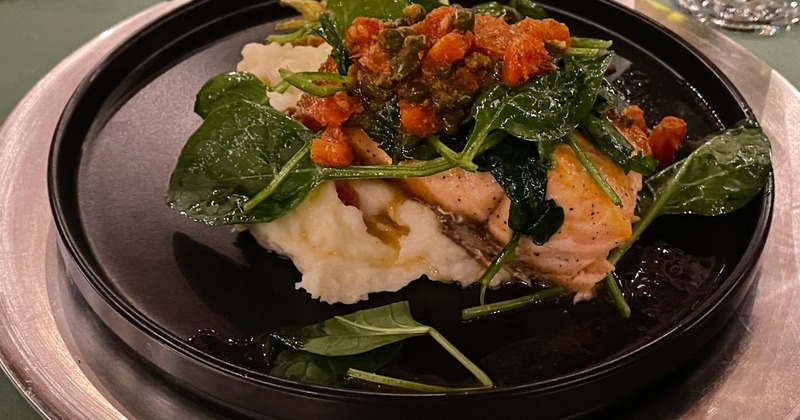 Oven roasted salmon with fresh spinach and mashed potatoes, served