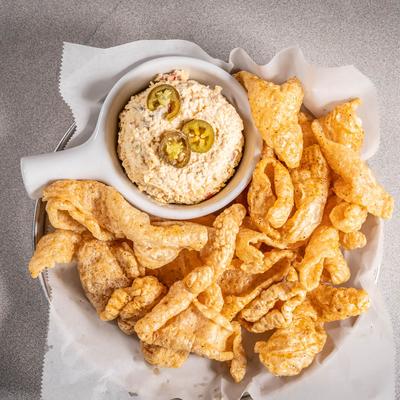 Jalapeno pimiento cheese served with pork rinds