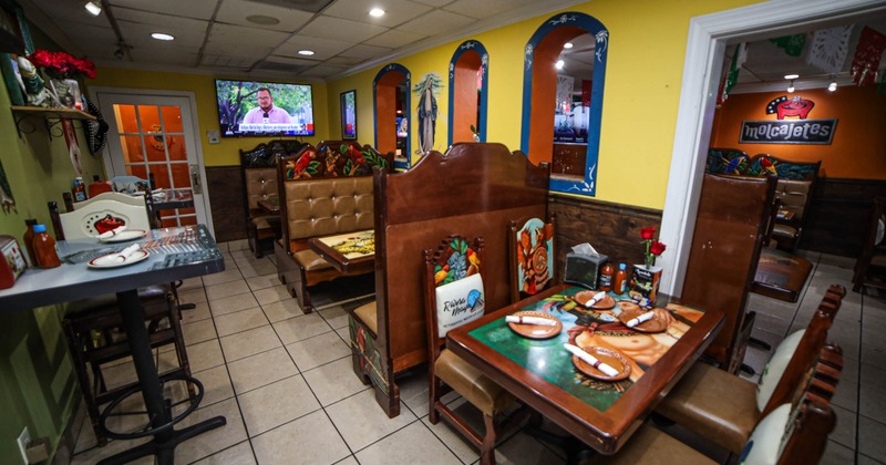 Interior with booths, tables and chairs