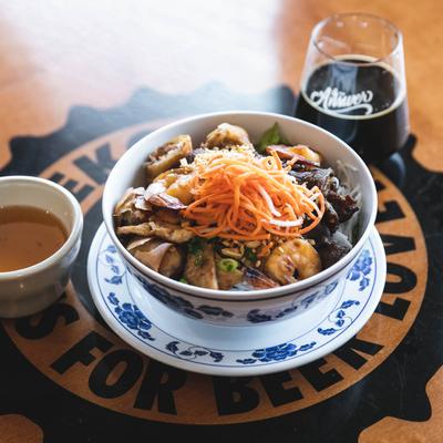 Rice noodle salad with dressing on the side.