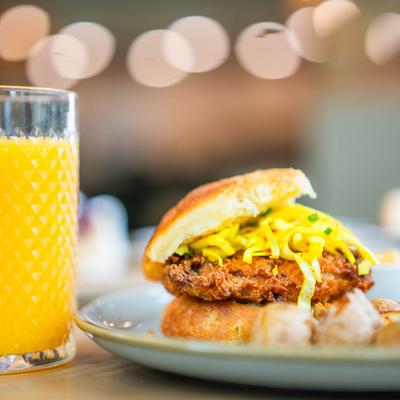 Nashville deluxe sandwich and a glass of orange juice.