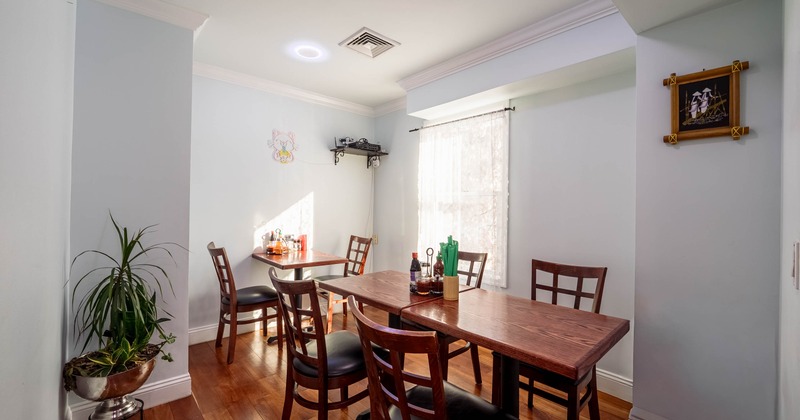 Interior, tables and chairs ready for guests