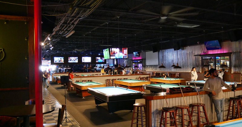 Sport bar interior space, pool tables