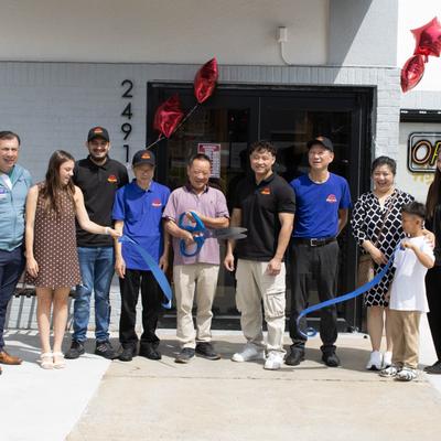 Opening ceremony featuring cutting a ribbon with scissors.