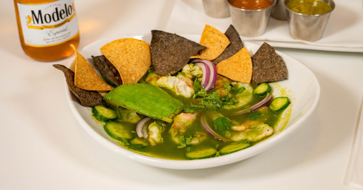 Aguachile served with tortilla chips on the side