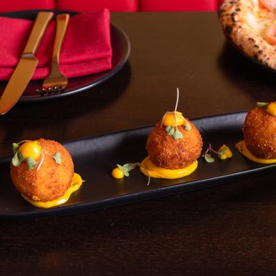 Fried stuffed rice balls.